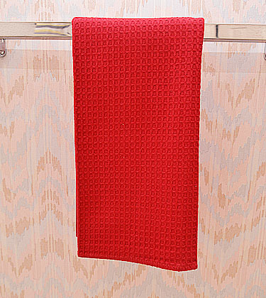Festive colored waffle weaves kitchen towel. Red colored